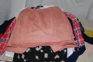 About 20 Tops size Medium
