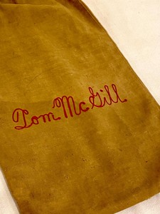 lot 88 image: Antique Drawstring Bag Embroidered Tom McGill