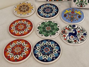 lot 243 image: Colorful Vintage Trivet and Coasters