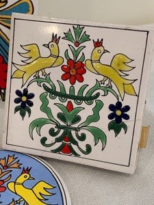 lot 245 image: Four Decorative Trivets