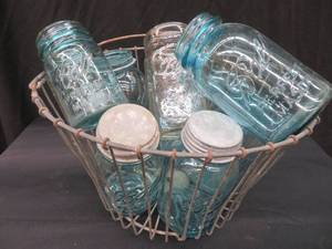 lot 27 image: METAL BASKET FULL OF BLUE BALL JARS