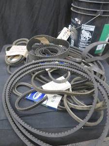 lot 59 image: BUCKET OF NEW BELTS