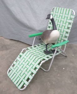lot 76 image: GOOSE DECOY WITH GREEN LAWN CHAIR