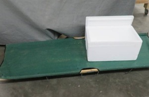 lot 114 image: CAMPING COT AND LARGE COOLER BOX