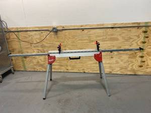 lot 44 image: MIWAUKEE Folding Miter Saw Stand