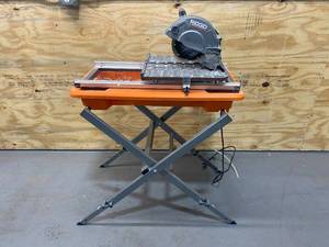 lot 20 image: RIDGID 9 Amp Corded 7 in. Wet Tile Saw with Stand