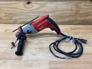 lot 8 image: MILWAUKEE Corded Electric Hammer Drill  12in. Chuck, 7.5 Amp, 2500 RPM, 40,000 BPM