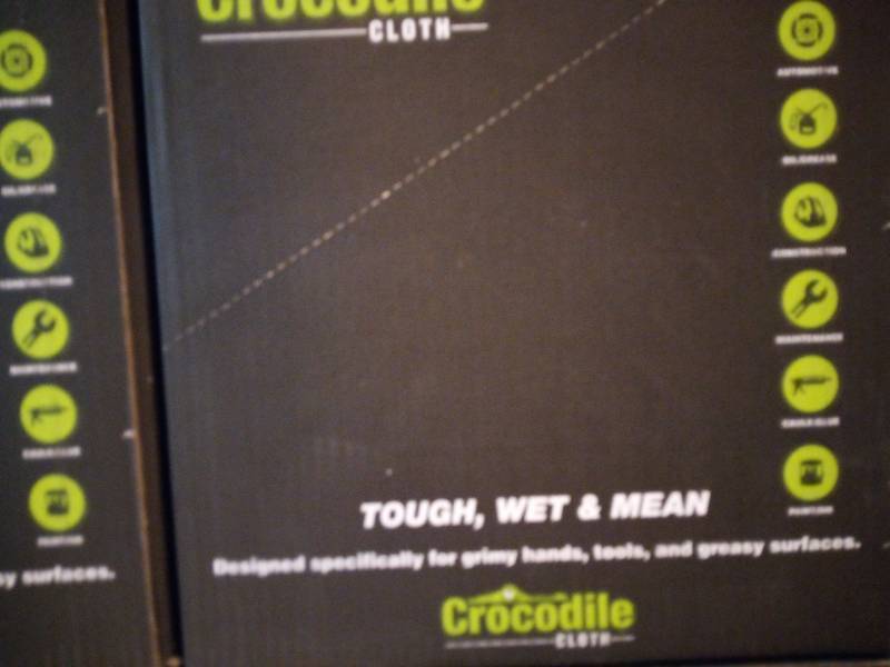 lot 26 image: 3 Packs of The tough, wet & mean Crocodile Clothes. Not just great for sanitation but also fights and cleans grime.