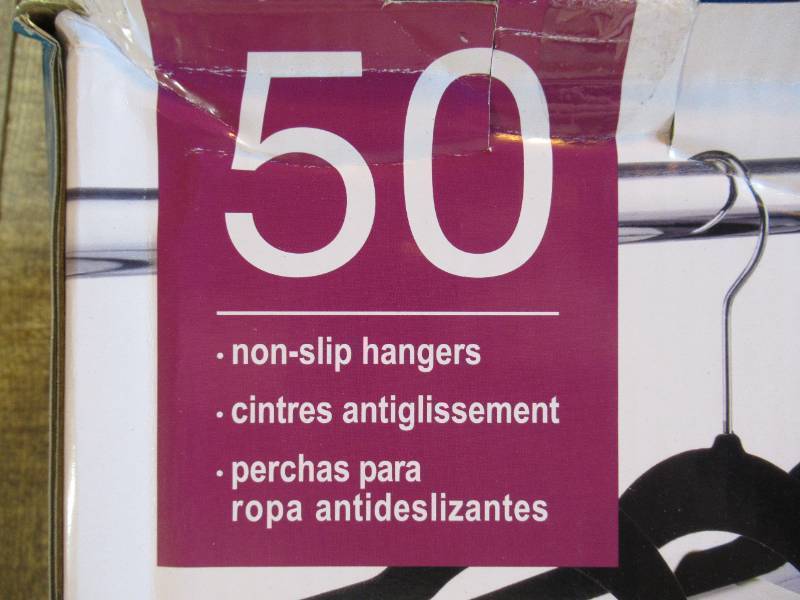 lot 46 image: New In Distressed Box. 50 Non-Slip Space-Saving Hangers M61B