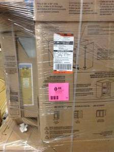 lot 13 image: Pallet with assorted Kitchen Cabinets various sizes and models customer returns see pictures