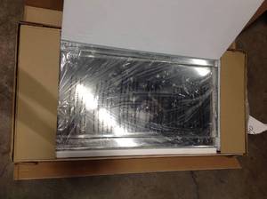 lot 14 image: Empire Art Direct Wall Mirror 54-in L x 24-in W Clear Beveled Wall Mirror  see pictures not used