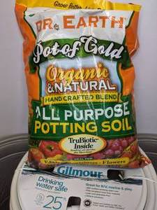 lot 152 image: Lot of New Gardening Items  Potting Soil, Drinking Water Safe Hose, Hose Pots, Watering Pitchers