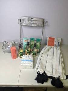 lot 128 image: New Bathroom Supplies Opal House Light Filtering Curtain, Ivory Soaps, Garnier Fructis ShampooConditioner, Ever Spring Liquid Hand Soap, & More
