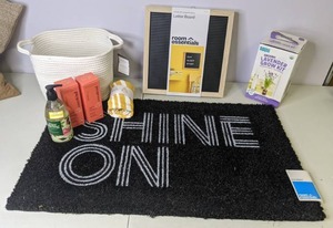 lot 143 image: Mixed Lot Room Essentials Letter Board, Ever Spring Liquid Hand Soap, Room Essentials Doormat, & More - All New