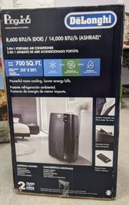 lot 72 image: New DeLonghi Pinguino Portable Air Conditioner