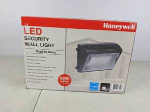 lot 97 image: New Honeywell LED Security Wall Light Dust to Dawn 6000 Lumens