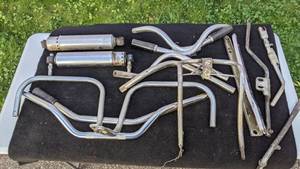 lot 45 image: Assortment of Handlebars and Spare Parts