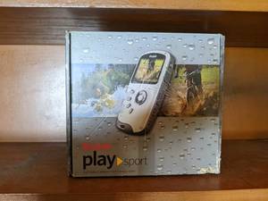lot 293 image: Outdoors Lot  Kodak Playsport Video Camera, Nikon KoolPix 950 Camera, Bushnell Sportview Binoculars & a Phone