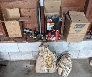 lot 176 image: Misc Garage Items Concrete Mix, Pulleys, Nails, Hitch, Chain Link Fence