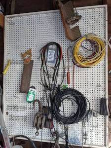 lot 183 image: Collection of Garage Tools Extension Cords, Saw, Belt, and More