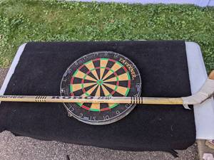 lot 70 image: The Sportsmens Lot Hockey Stick, Fishing Gear, Dartboard, Baseball Mitt & Ball, Football and MORE