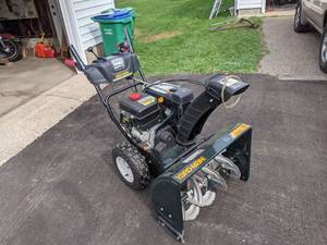 lot 10 image: Yard Man 28 Snowblower