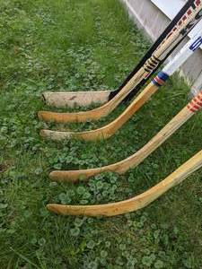 lot 84 image: Lot of (4) Left Handed Hockey Sticks & (1) Goalie Stick (KOHO, Sherwood & Louisville)