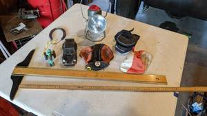 lot 124 image: Miscellaneous Vintage Garage Lot - Auburn Toy Tractor, Diecast Model Car, Railroad Lantern, Horseshoe, Harley-Davidson Cap, Drafting T-Square