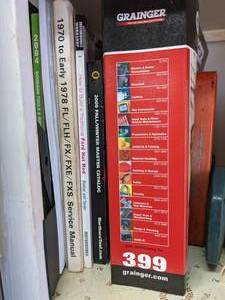 lot 215 image: Lot of Automotive Supplies Service Manuals, Dent Pullers, Brake Bleeding Kit, Fire Extinguisher & More