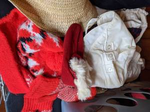 lot 279 image: Miscellaneous Clothes, Hats and Gloves in Laundry Basket