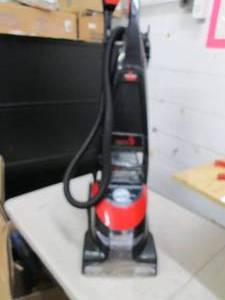 bissel pro heat essintals powers on...