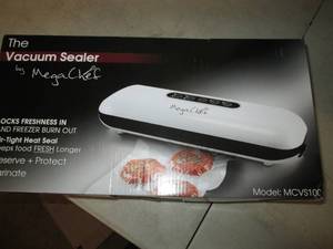 The Vacuum Sealer by Mega Chef, pow...