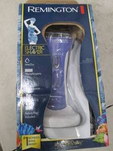reminton electric shaver purple and...