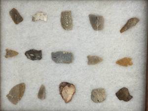 lot 136 image: Collection of Native American Arrowheads in a Display