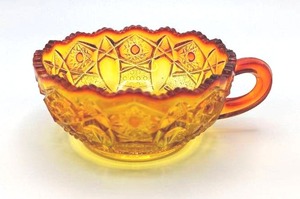 lot 420 image: Glowing EAPG Amberina Nappy Sauce Bowl