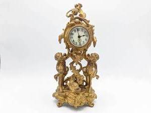 lot 203 image: Art Nouveau Guilt New Haven Figural Mantle Clock