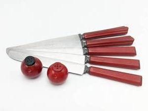 lot 231 image: Cherry Red Bakelite Butter Knives and Art Deco SaltPepper Shakers