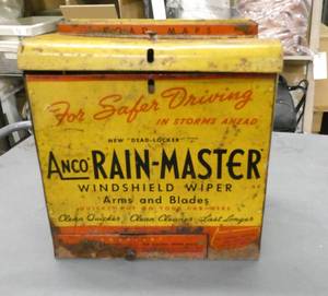 lot 10 image: Vintage advertising tin dispenser for Anco windshield wipers, even has a bunch of wipers still with it