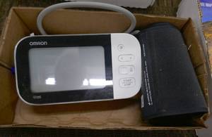 lot 48 image: Nice Omron Blood pressure cuff with digital readout