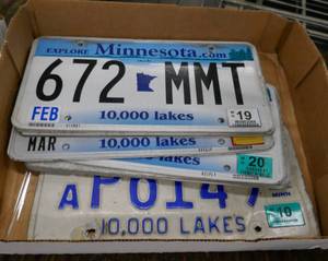 lot 57 image: box of 11 Minnesota license plates