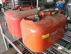lot 66 image: 2 fishing boat gas tanks, 6 gallon, one OMC and one mercury