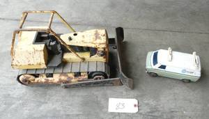 lot 83 image: Tonka bulldozer that could use a little restoration and a bell truck