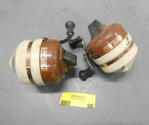 lot 96 image: Two Zebco 808 spincast reels and 2 fishing poles