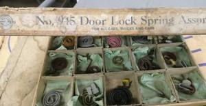 lot 99 image: Vintage case of Champ door lock springs for all cars and trucks 1928-42