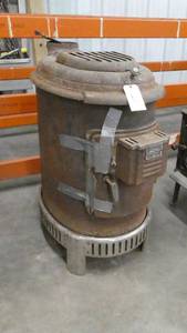 lot 107 image: Old cast iron furnace