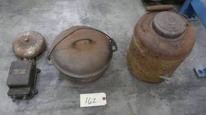 lot 149 image: group of primitives, bell, cast iron kettle, steel water jug