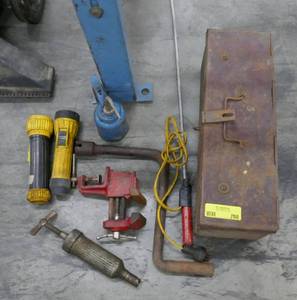 lot 150 image: tool box with various tools and flashlights, oil can