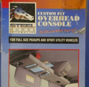 lot 159 image: overhead console unit for full size pickups, new in box, water damaged box