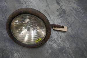 lot 168 image: car headlamp - tag says it is for a Jameson