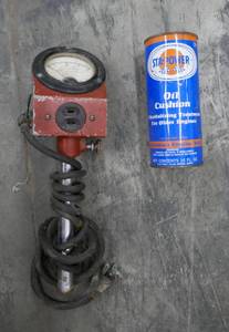 lot 173 image: vintage ampmeter and an unopened can of Sta-power